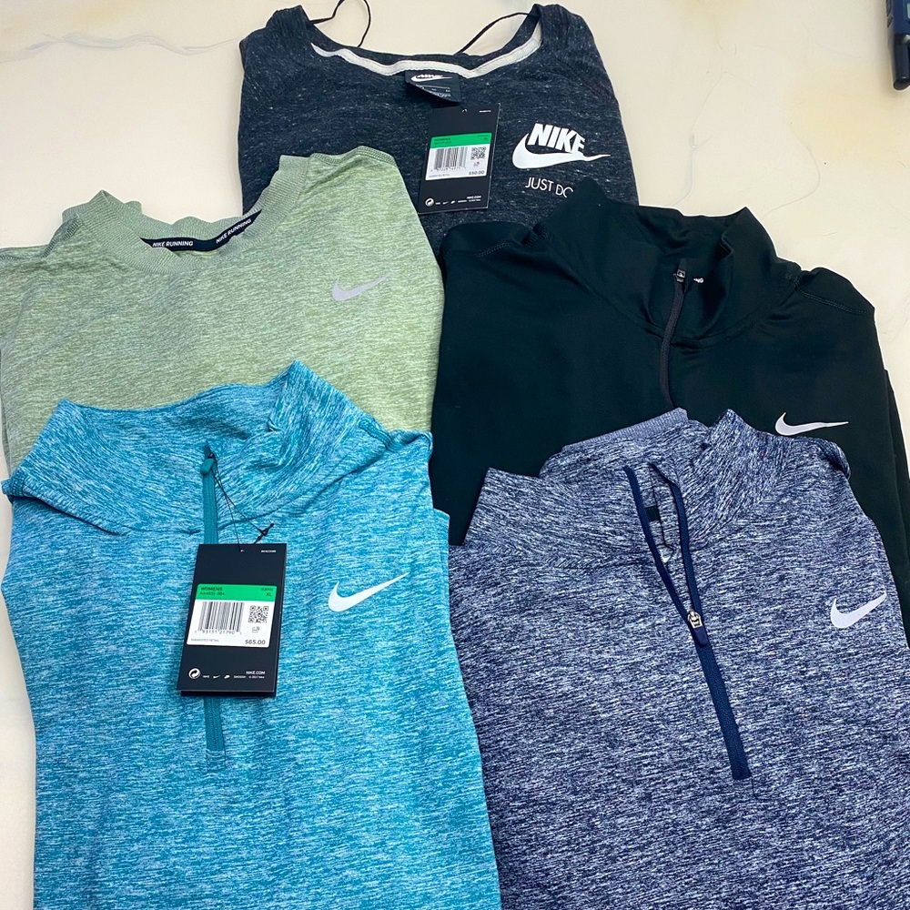 Bundle of 5 Nike Dri Fit shirts. Womens XL. NWT on most.